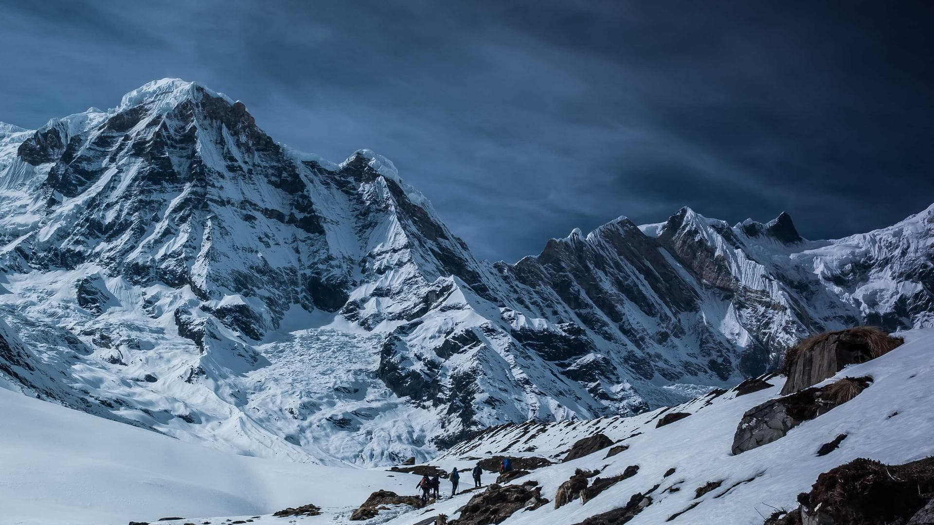 A breathtaking panoramic view of the Tatra Mountains in Poland at sunrise.